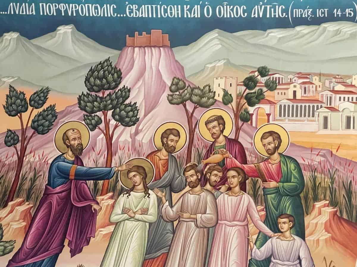 Church entrance with landscaping and a welcoming door